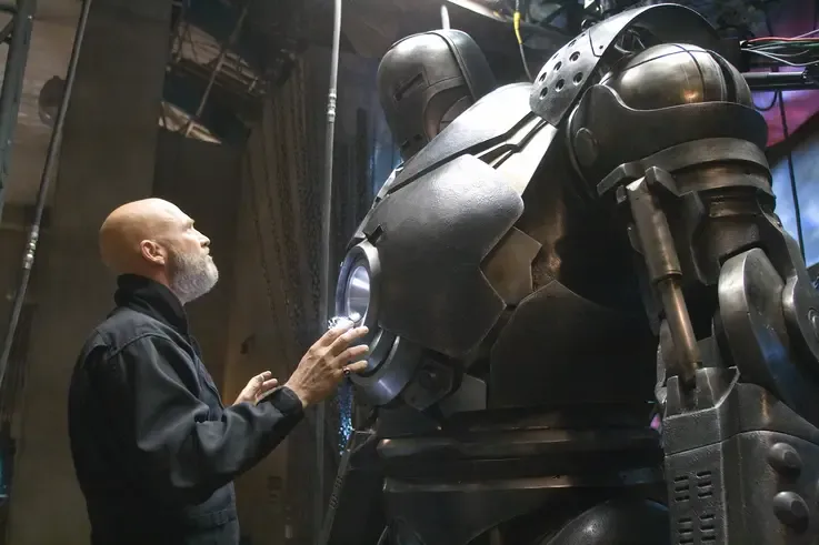 Obadiah Stane with his suit of armor